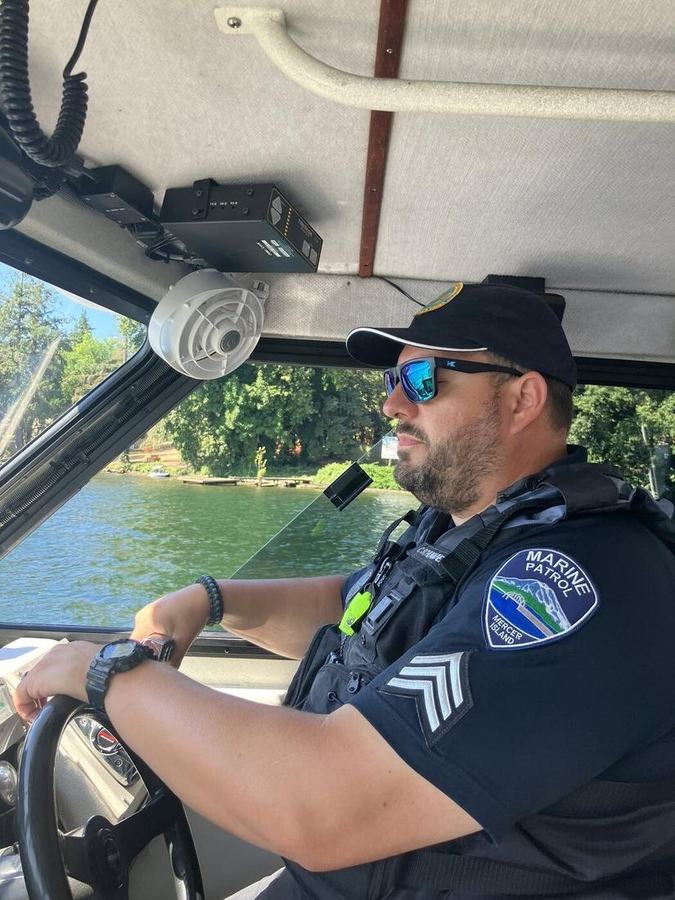 MIPD Marine Patrol sergeant at the helm of the patrol boat