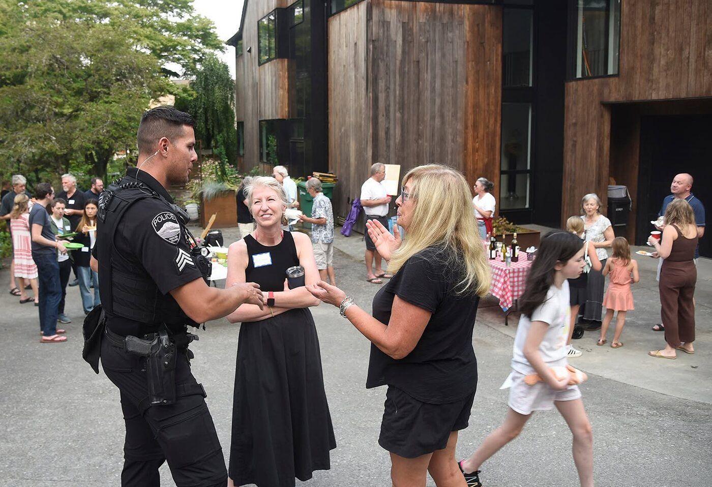 Officer speaking with neighbors
