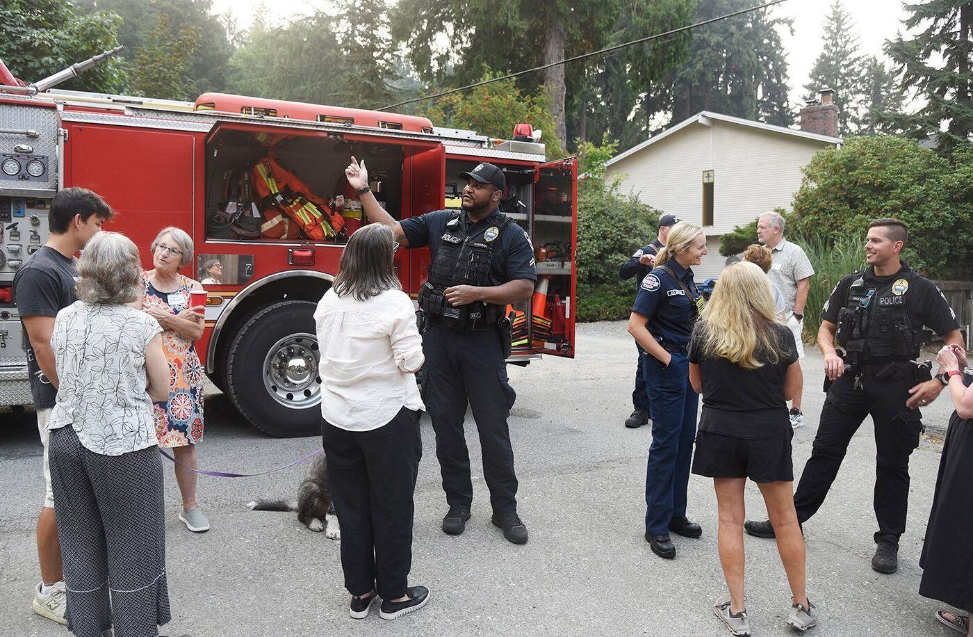 Neighbors gathered with police and fire